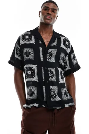 ADPT. Oversized revere collar shirt with bandana print in