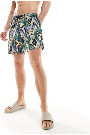 ASOS Swim shorts in mid length in abstract print in