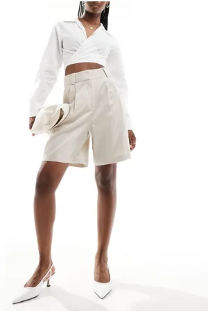 & OTHER STORIES Linen blend longline shorts with front pleats in beige