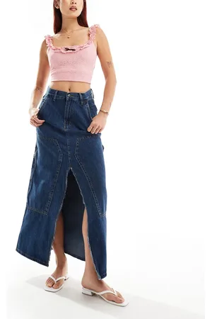 Moon River Front slit denim midi skirt in mid
