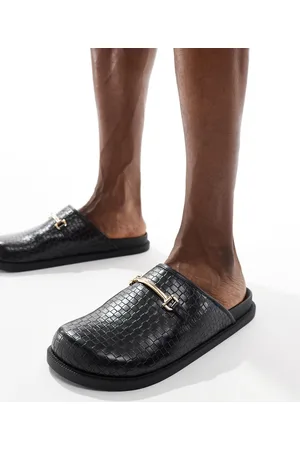 ASOS Weave mule in black with gold snaffle
