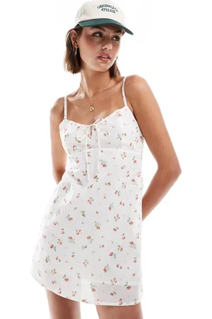 Cotton On Cotton On mini cami dress with rushing in strawberry ditsy print