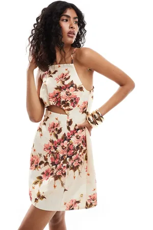 ASOS Structured square neck cross back mini dress with cut outs in abstract floral print