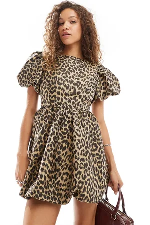 Sister Jane Puff sleeve bubble jacquard mini dress in leopard