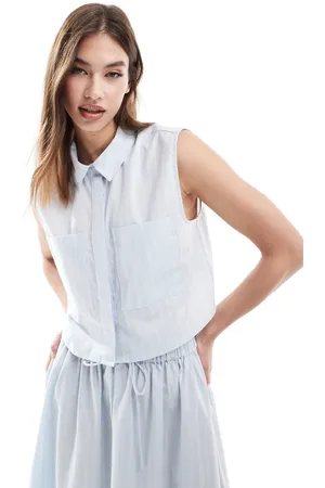 ASOS Sleeveless cropped shirt in blue and white stripe