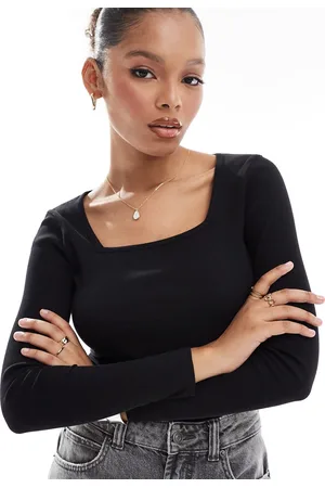 Threadbare Ribbed long sleeve bodysuit in