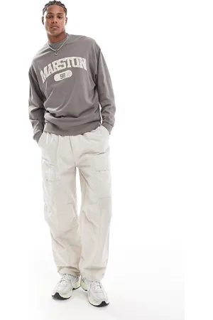 ASOS Oversized sweatshirt with collegiate print in