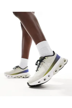 On Running ON Cloudspark running trainers in white and