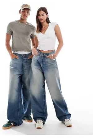 Weekday Unisex Astro loose fit wide leg jeans in streaky wash