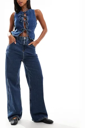 Tommy Hilfiger Low rise baggy jeans in mid wash