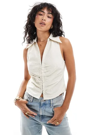 MANGO Clasp front sleeveless waistcoat in light beige