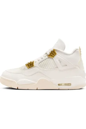 Jordan Nike Air 4 Retro trainers in sail and metallic gold