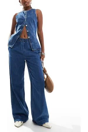 Pieces® Elasticated waist wide leg jeans in medium wash