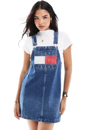 Tommy Hilfiger Retro flag denim dungaree dress in mid wash