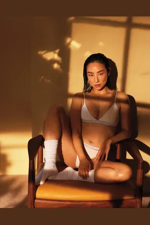Calvin Klein Tonal Logo Cotton triangle bralette with gold detail logo taping in cream