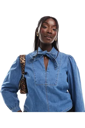 ASOS ASOS DESIGN Curve denim bow neck shirt in mid