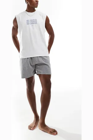 ASOS Pyjama set with hit snooze artwork in
