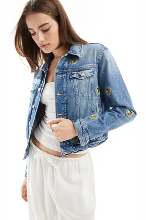 Tommy Hilfiger Slim denim jacket in mid wash with crest logos