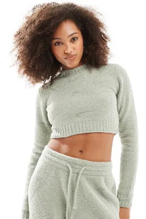 Nike Phoenix Boucle all over print swoosh long sleeve crop top in light
