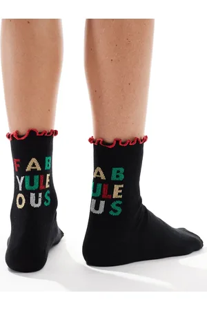ASOS Christmas slogan sock with frill edge in