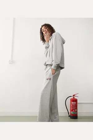 COLLUSION Overszied cuffed joggers with burgundy print co-ord in marl