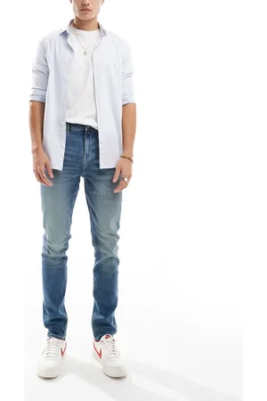 ASOS Skinny jeans with green tint in dark wash