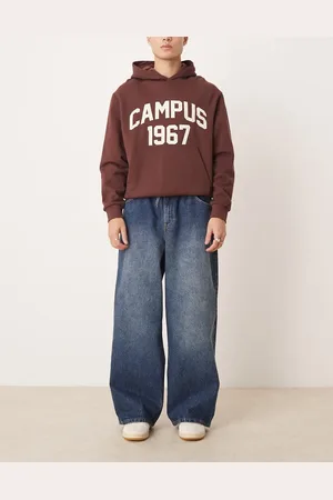 ASOS Super baggy jeans with tie waistband in mid wash