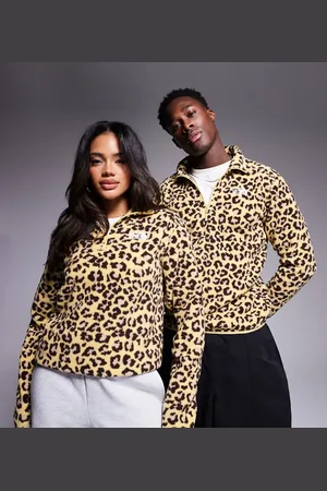 The North Face Shispare 1/4 zip logo fleece in leopard print exclusive to ASOS