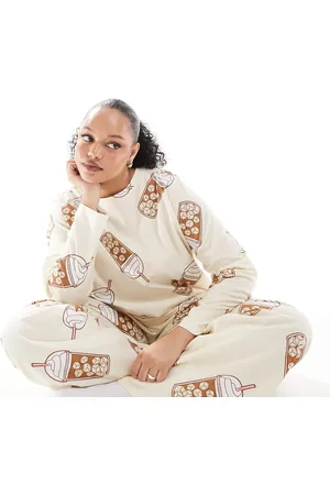ASOS ASOS DESIGN Curve Iced coffee long sleeve top and trouser pyjama set in beige