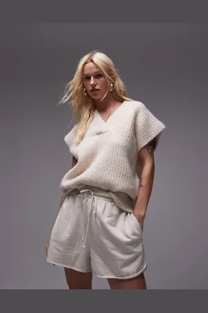 Topshop Knitted v-neck relaxed fluffy ribbed vest in oat
