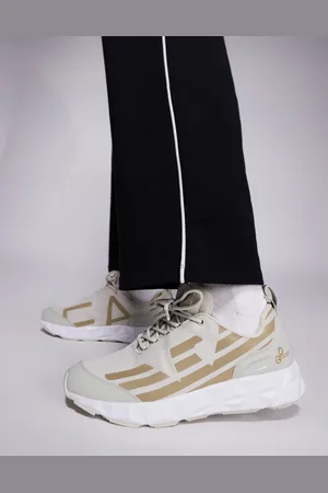 EA7 Armani logo knit trainer in beige and gold