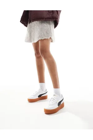 PUMA Palermo Eleveta trainers in with gum sole