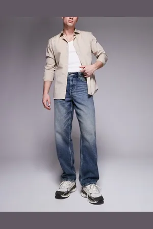 ASOS Baggy fit jeans with vintage tint in mid wash
