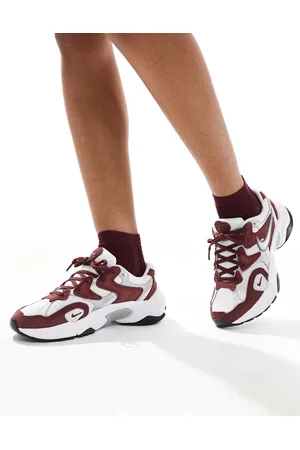 Nike AL8 trainers in burgundy and