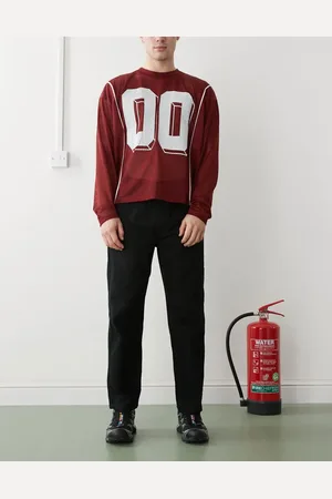 A Bathing Ape Aape by A Bathing Ape elasticated waist straight leg logo jeans in black