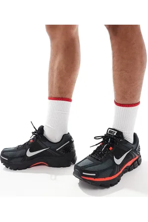 Nike Zoom Vomero 5 trainers in and metallic silver