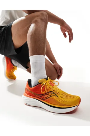 Saucony Ride 18 running trainers in pollen and pepper