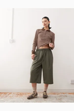 Monki Long sleeved pique polo in and chocolate brown stripe