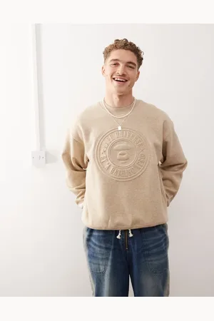 A Bathing Ape Aape By A Bathing Ape embossed logo sweatshirt in beige