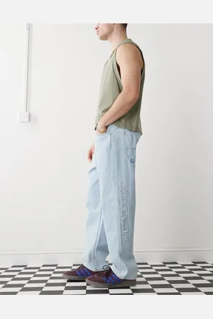 A Bathing Ape Aape by A Bathing Ape loose fit logo jeans in light wash