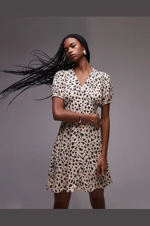 & OTHER STORIES Button through mini dress in black and beige hearts print