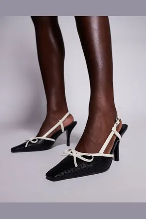Public Desire Alchemy laser cute sling back heels with bow in cream and black