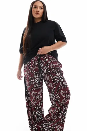 ASOS Curve pull on trousers with contrast panel in dark cherry bandada print