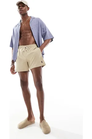 Ralph Lauren Traveler icon logo slim fit mid swim shorts in beige