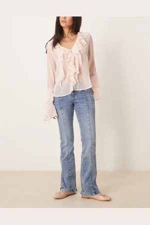 Gina Tricot Low rise flare leg jeans with front panel detail in mid wash