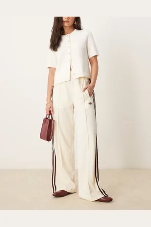adidas Firebird Loose track pants in cream and burgundy