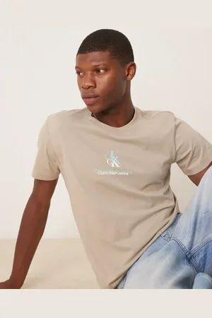 Calvin Klein Shadow logo t-shirt in beige and aqua blue