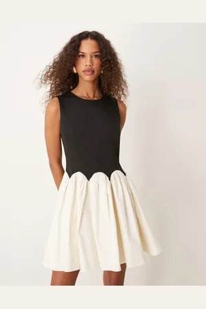 Never Fully Dressed Contrast drop hem mini dress in monochrome