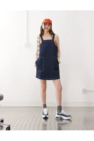 Reclaimed Mini denim pinafore dress in indigo wash