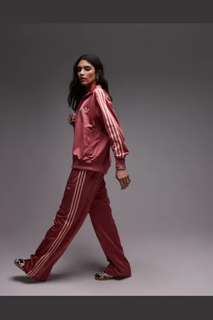 adidas Loose Fit Firebird track pants in pink Exclusive to ASOS